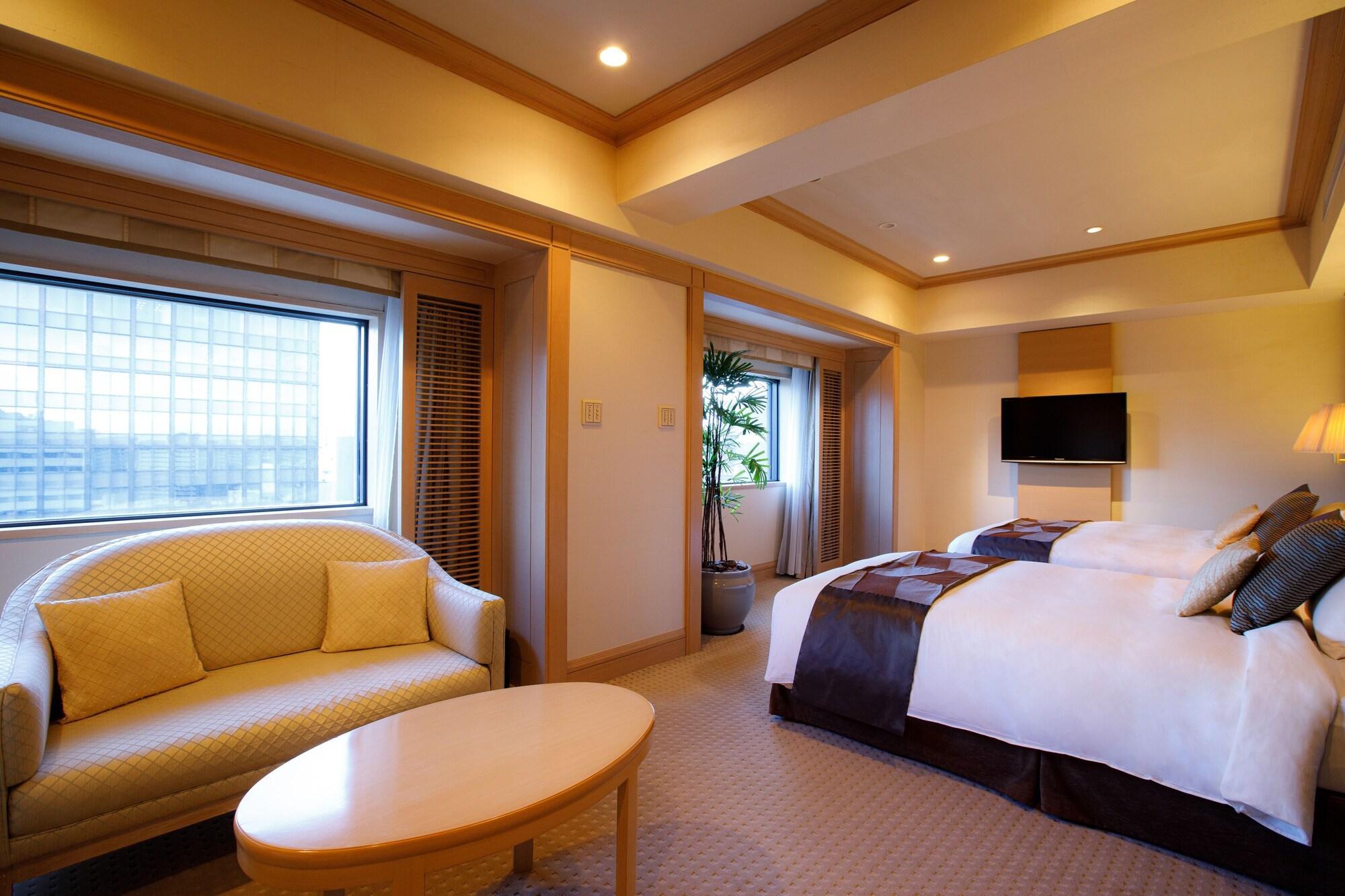 פוקואוקה Hotel New Otani Hakata מראה חיצוני תמונה A room at the hotel